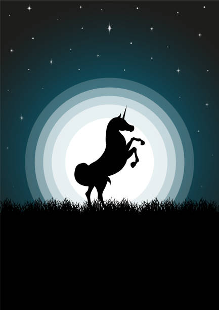 istock Magic unicorn silhouette standing in spring dusk meadow. Misty landscape, full moon and horse 2135638765