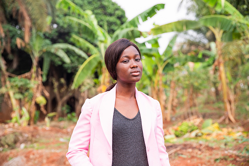 Portrait of a serious young African businesswoman outdoors.