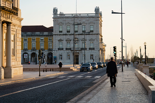 Seaside street Av. Ribeira das Naus next to Praca do comercio in Lisbon, Portugal. February 2, 2024.