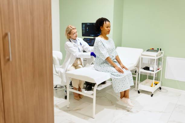 istock Doctor performing a spine check on patient 2135684188