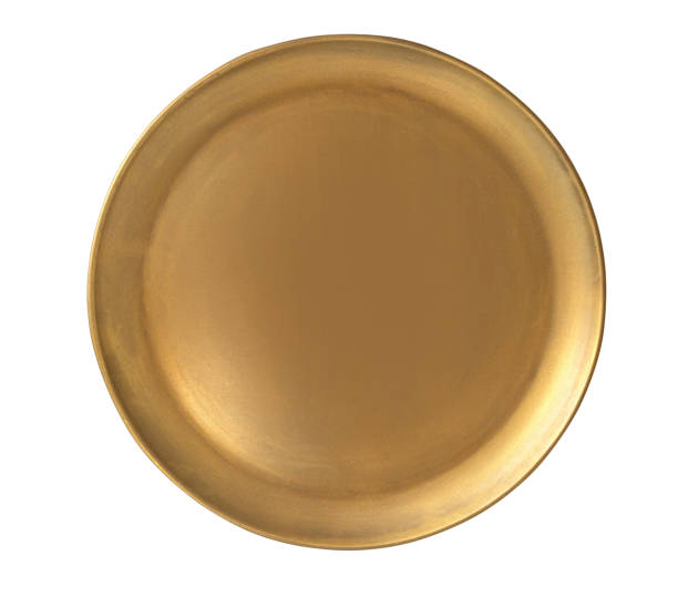 istock Top view of golden plate isolated 2135687448