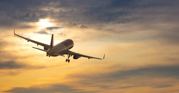 istock Airplane. Landscape with big white passenger airplane 2135688012