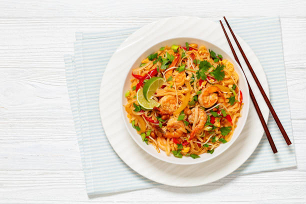 istock pad thai with shrimps, peanuts, eggs, bean sprouts 2135711566