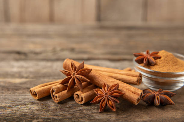 istock Cinnamon sticks and anise on a textured background. Cinnamon roll and star anise. Spicy spice for baking, desserts and drinks. Fragrant ground cinnamon.Place for text. copy space. 2135727346