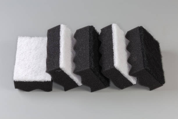 istock Black and white synthetic cleaning sponges on a gray background 2135729500