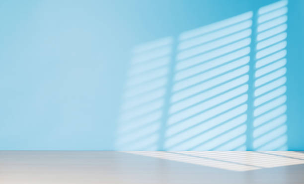 istock Wooden table and sunlit wall, product template 2135760678