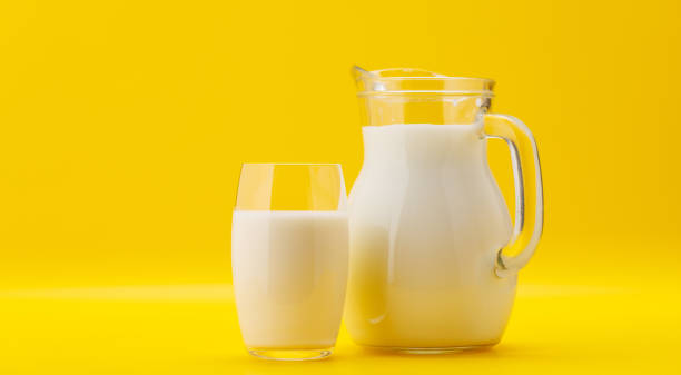 istock Fresh Milk in Pitcher and Glass 2135782305