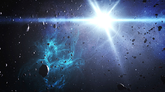 Asteroids rocks flying in deep blue space and sun flare