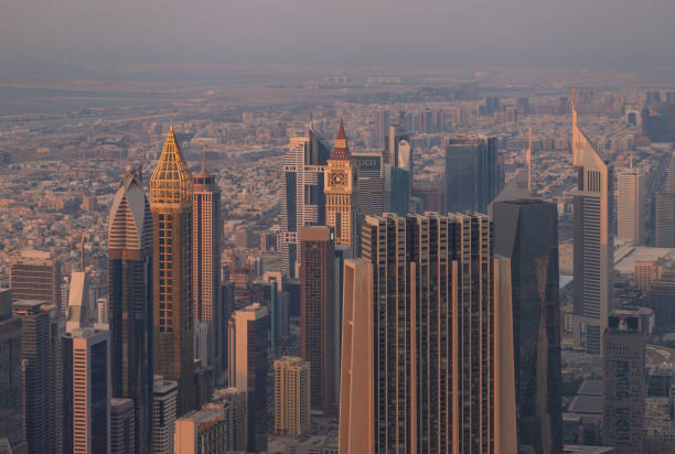 Dubai, United Arab Emirates - November 7, 2023: A picture of the tall buildings at the Trade Centre district at sunset.