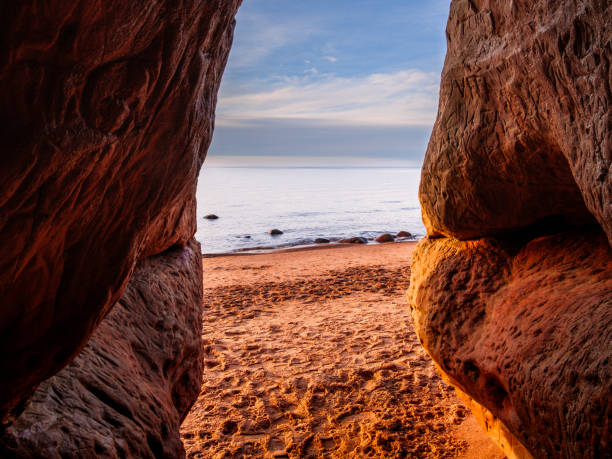 istock Dusk's Serenade: Sunset Spectacle from Veczemju Klintis Cave 2135833823