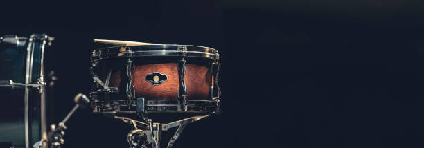 istock Snare drum on a dark background isolated with space for a text. 2135837526