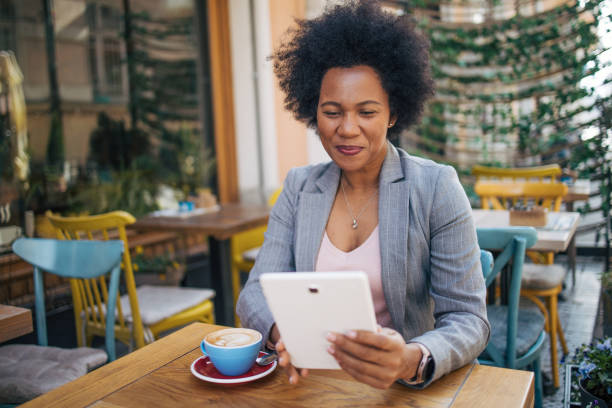 istock Woman having a video call at the cafe 2135852408