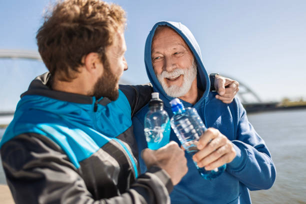 istock Father and Son Enjoying Rest Hydrating 2135856668
