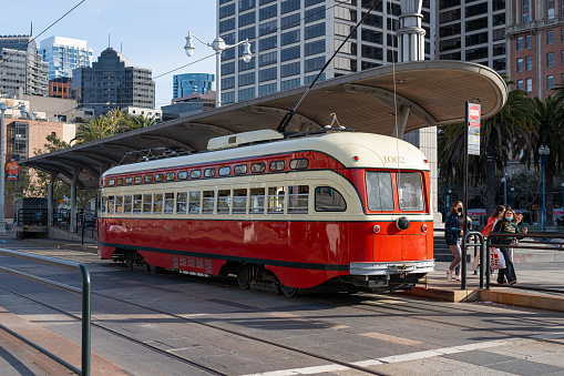 A red-colored San Francisco Historic Streetcar.