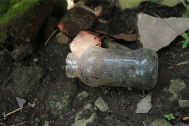 istock used bottles scattered in the yard 2135902659