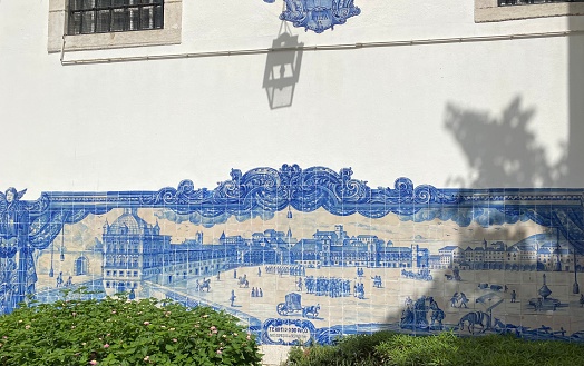 Long panel of blue and white azulejos, depicting the Paço square in Lisbon, Portugal.