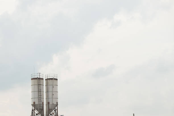 Two white factory tanks