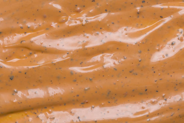 istock Whipped delicious sauce texture. Hamburger sauce background. 2136003861