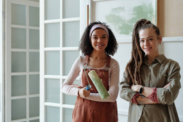 istock Happy young intercultural owners of cafe 2136101884