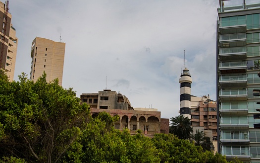 old and abandoned villa beside a lighthouse tower in Beirut