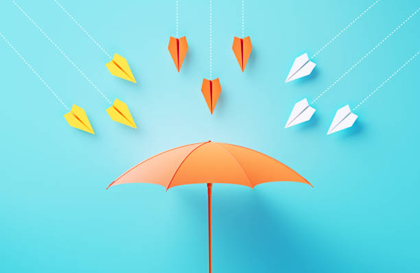 Paper Planes Flying Towards A Coral Colored Umbrella On Blue Background