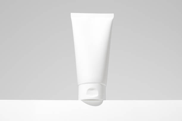 istock Empty white plastic tubes for cosmetics. Mockup. Packaging for cream, gel, serum, advertising and product promotion 2136194095