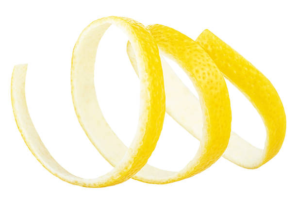 istock Swirly lemon peel curl isolated on a white background. Fresh citrus zest. 2136197211