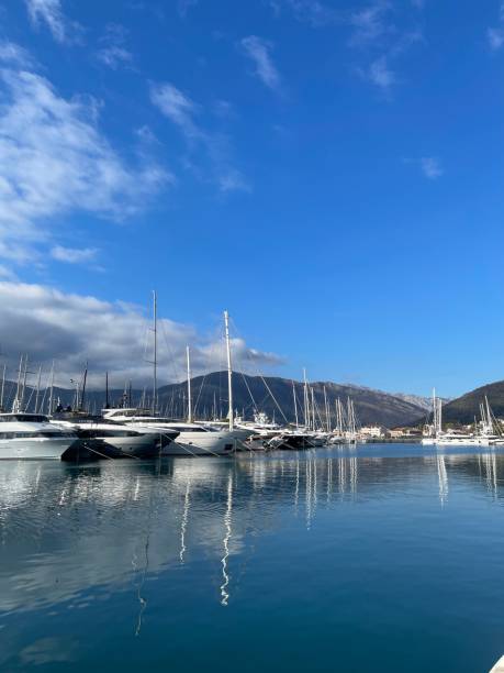 istock Reflection of a ship in the water, against the blue sky 2136235516