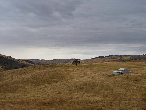 Moody skies over  farm land near Omeo in the Victorian High Country