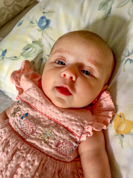 istock Two month baby awake and smiling 2136271746