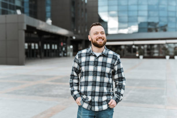 istock Smiling Male Sightseeing Around Urban Area 2136353617