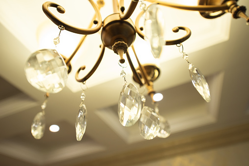 crystal  modern chandelier and vintage ornamental light fixture designed to be mounted on ceiling (banner size)