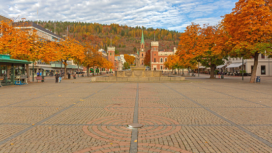 Drammen, Norway - October 30, 2016: Cobblestone Pavement at Bragernes Square in Town Centre at Autumn Day.