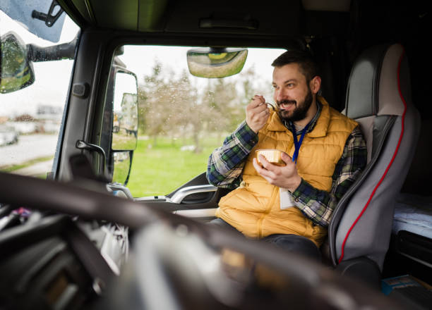 istock Truck drivers having a lunch break 2136459542