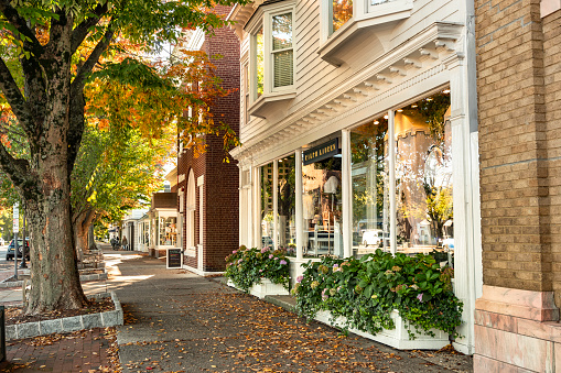 Southhampton, New York - October 27, 2022:  Downtown shopping district on the Main Street village of Southhampton in The Hamptons Long Island.  Southhampton is an incorporated village in Suffolk County.