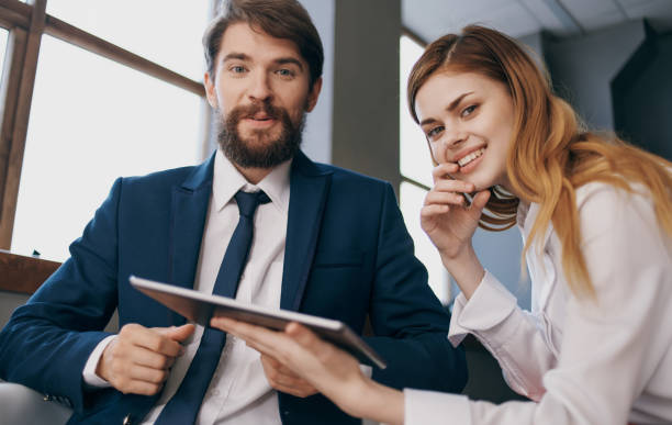 istock Man and woman internet communication technology professionals 2136573083