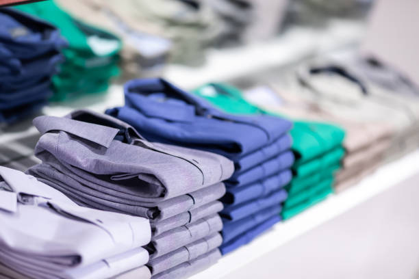 shirts on a shelf, trendy color shirts