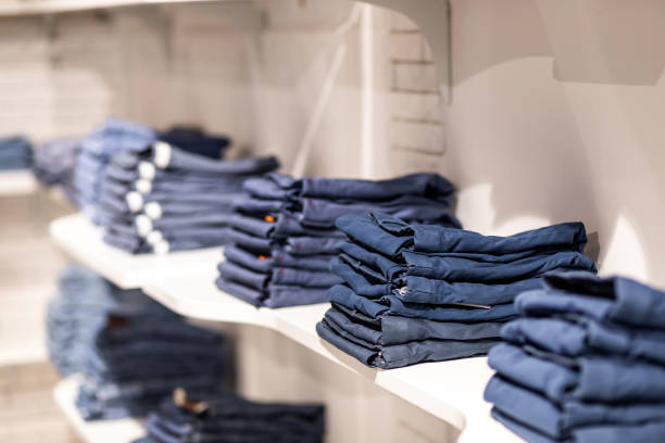 istock men's classic trousers on a shelf in a boutique 2136651295