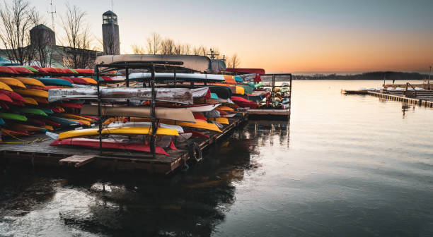 A morning view of the Toronto Harbour area.  This district attracts downtown residents and tourists to its many attractions, beautiful waterfront, bars, restaurants and shops.   Pictured here are various watercraft for leisure type pursuits.
