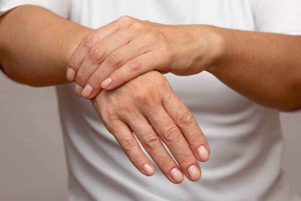 istock Woman hands showing right wrist pain 2136759257