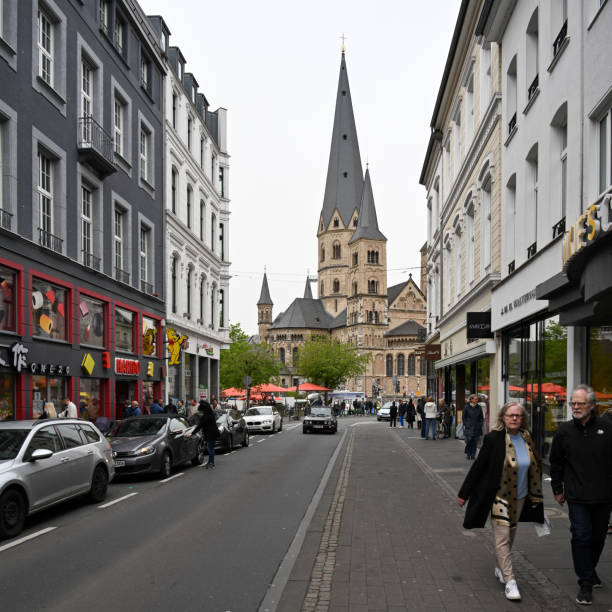 Bonn, Germany, March 30, 2024 - Bonn Minster, also known as the Minster Basilica, seen from Kaiserplatz.