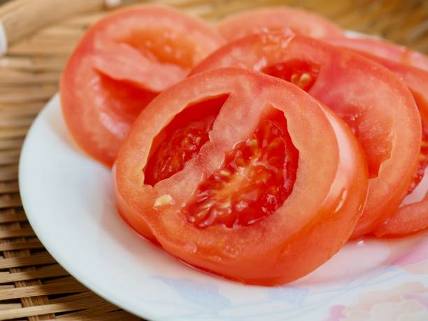 istock Fresh organic vegetable red tomato slices 2136966487