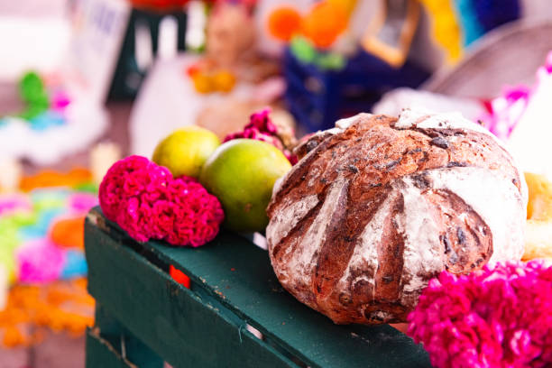 This is a close up of Day of the Dead altar decorations hanging on display in Playa del Carmen, Mexico.