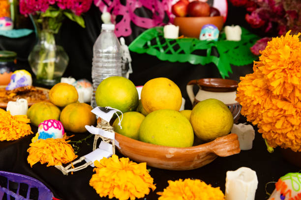 This is a close up of Day of the Dead altar decorations hanging on display in Playa del Carmen, Mexico.