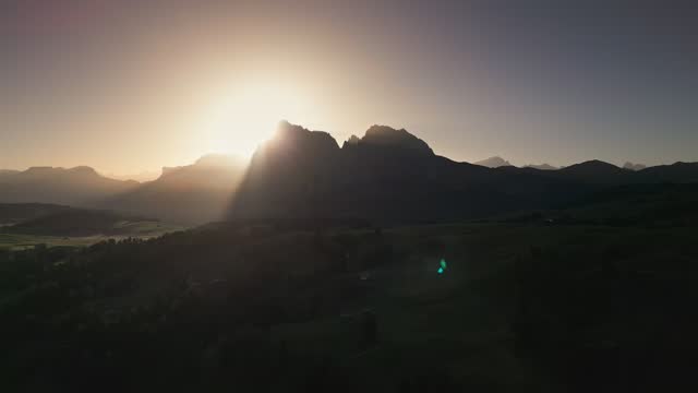 4K Aerial view Real time Footage of Seiser Alm at the sunrise time, Famous landmark in northern Italy. Europe Sunrise in Italian Dolomites.