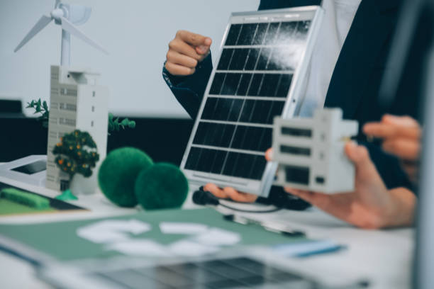 istock Carbon offset price report CO2 emission. Future growth Net zero waste in ESG ethical SME office protect climate change global warming social issues project. Group of asia people Eco friendly SDGs plan 2137136174