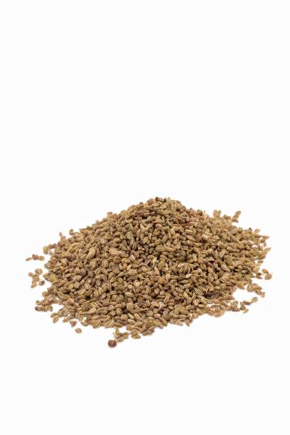istock Ajwain Seeds or Ajowan Isolated on White Background with Copy Space. Also Known as Thymol Seeds or Ajowan Caraway in Vertical Orientation 2137160789