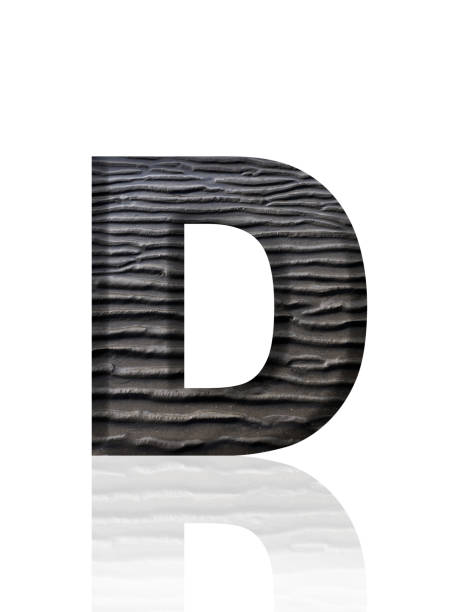 istock Isolated shot of three-dimensional mud flat pattern alphabet letter D on white background 2137185298