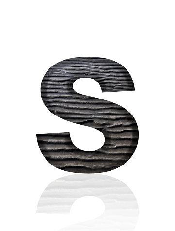 Close-up of three-dimensional mud flat pattern alphabet letter S on white background.