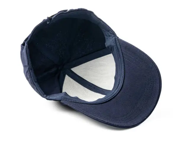 Photo of Navy Blue Baseball Cap on a White Background With Clear Lighting